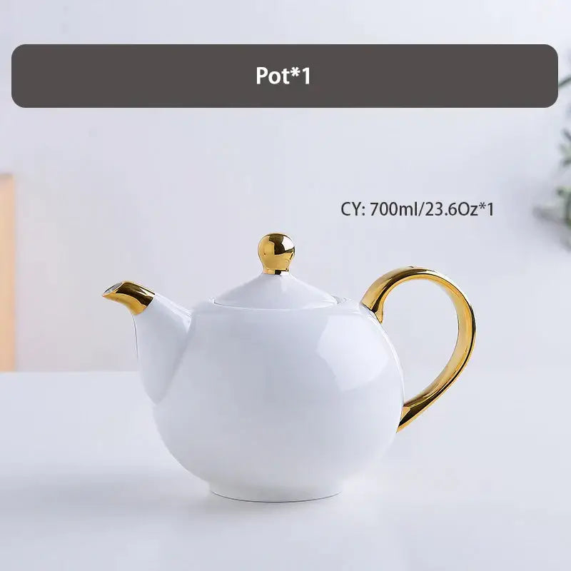 A sleek white ceramic teapot with gold accents from the decorbites elegant bone china tea set for refined dining