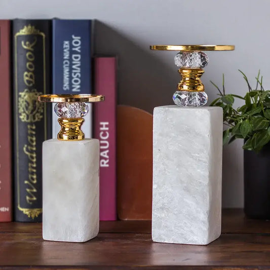 Elegant white and gold marble candle holder with faceted crystal tops perfect for decorbites gold marble dining room decor