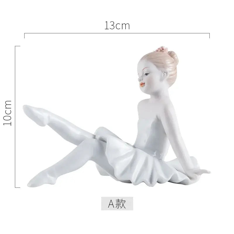 Elegant white porcelain ballet girl figurine with soft pink hair bun and blush posed seated for bedroom decor