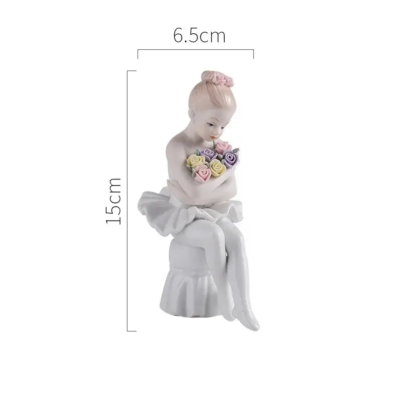 Elegant white porcelain ballet girl figurine seated in ruffled dress holding pastel bouquet for bedroom decor