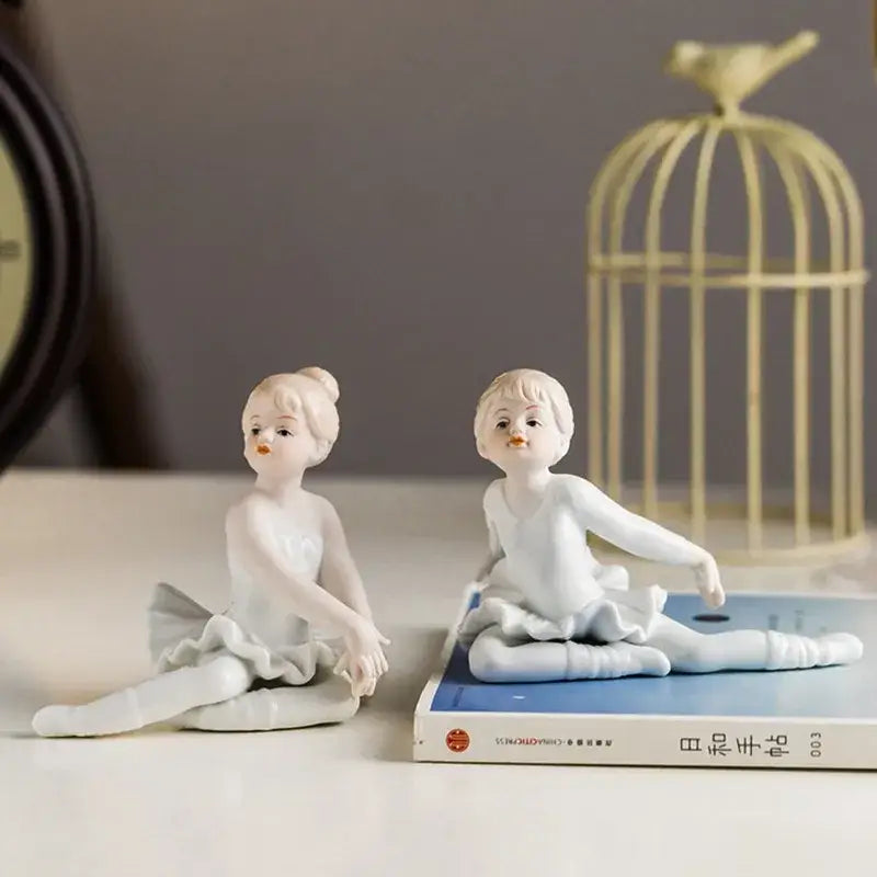 Elegant white porcelain ballet girl figurines set featuring two delicate ballerina girl figurines for bedroom decor