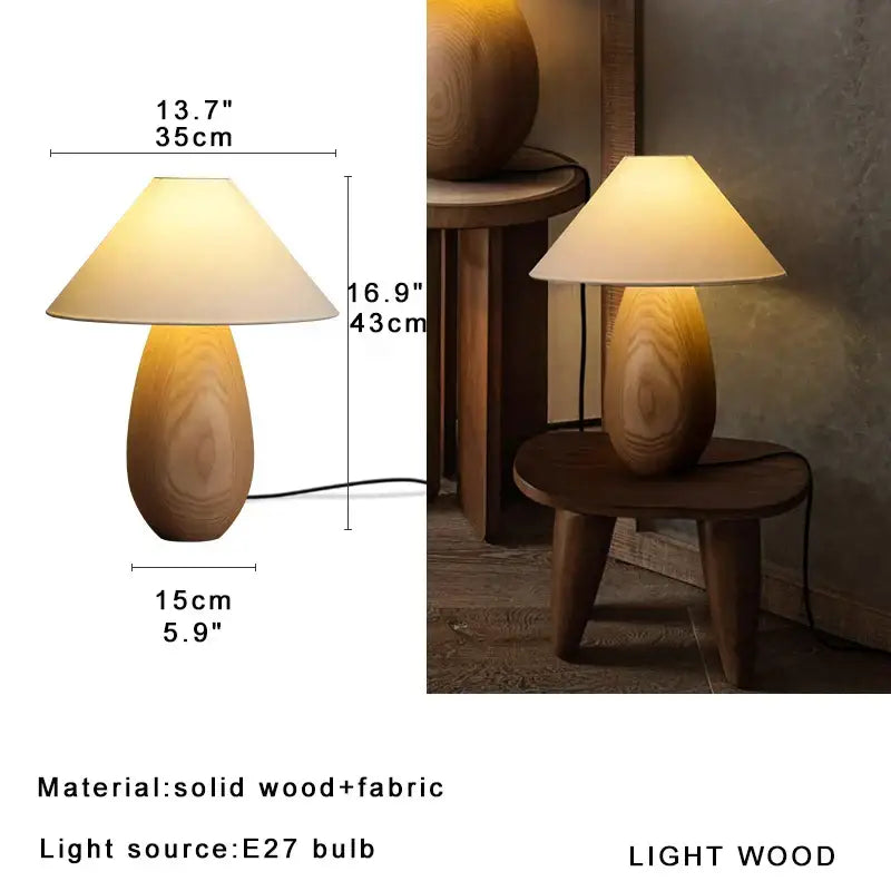 Elegant wood table lamp by decorbites with warm-toned teardrop wood base and cream fabric shade for bedroom decor