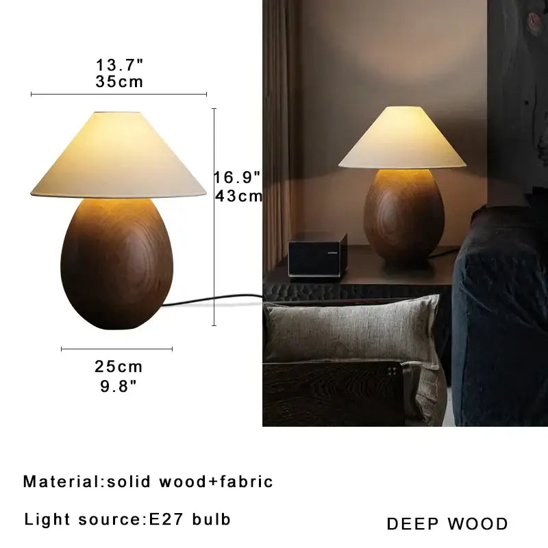 Elegant wood table lamp with warm-toned teardrop wooden base and cream fabric shade by decorbites for bedroom decor