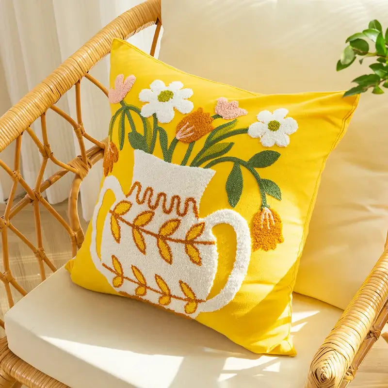 Bright yellow cushion cover with white embroidered vase flower and colorful blooms by decorbites elegant yellow collection