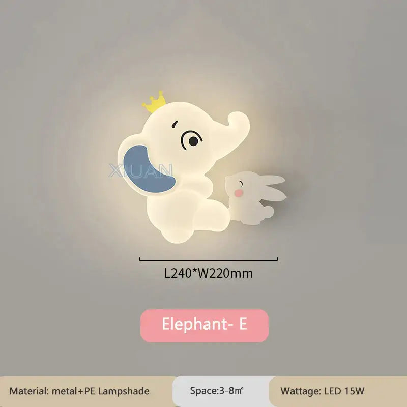Cute white cartoon wall light shaped like an elephant with a blue ear yellow crown and a small rabbit figure for baby room
