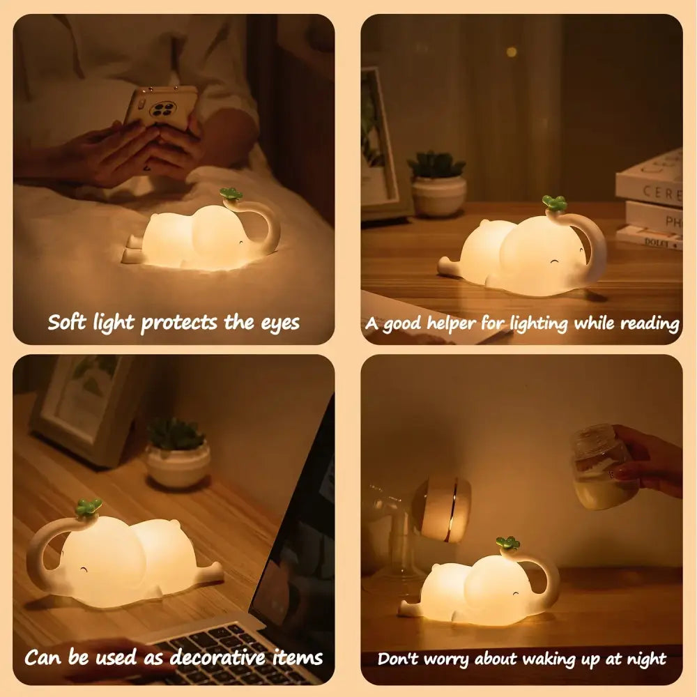 A soft glowing white decorbites elephant silicone night light with a green clover leaf on its back for bedroom decor