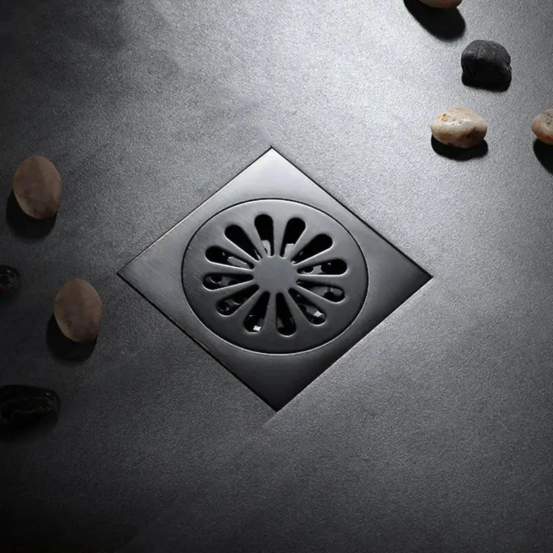 Embossed floral black brass square floor drain with sunburst pattern for shower room by decorbites brass square