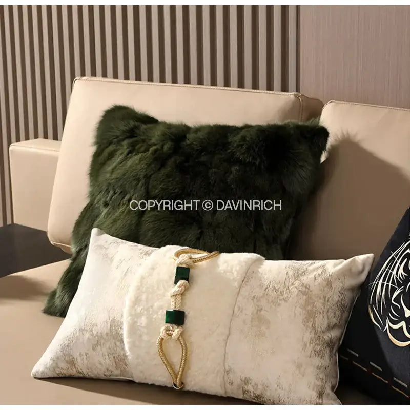 Dark green faux fur throw pillow with plush textured surface complementing decorbites embossed floral cushion cover