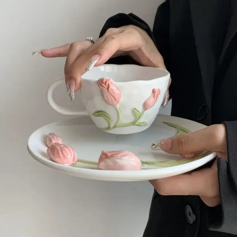 White ceramic teacup and saucer set with pink embossed tulip ceramic design ideal for dining room decorbites 3d embossed use