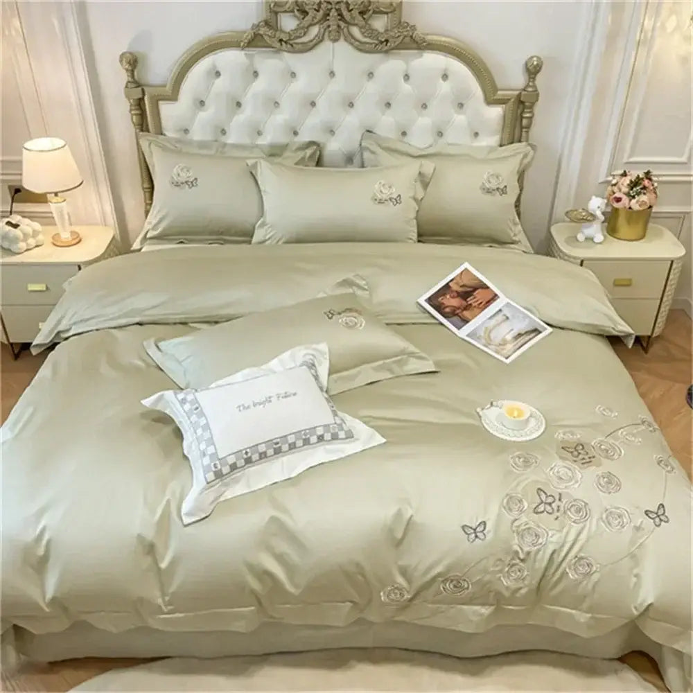 Soft sage green satin duvet cover set with silver butterfly and rose embroidery made of egyptian cotton for bedroom use