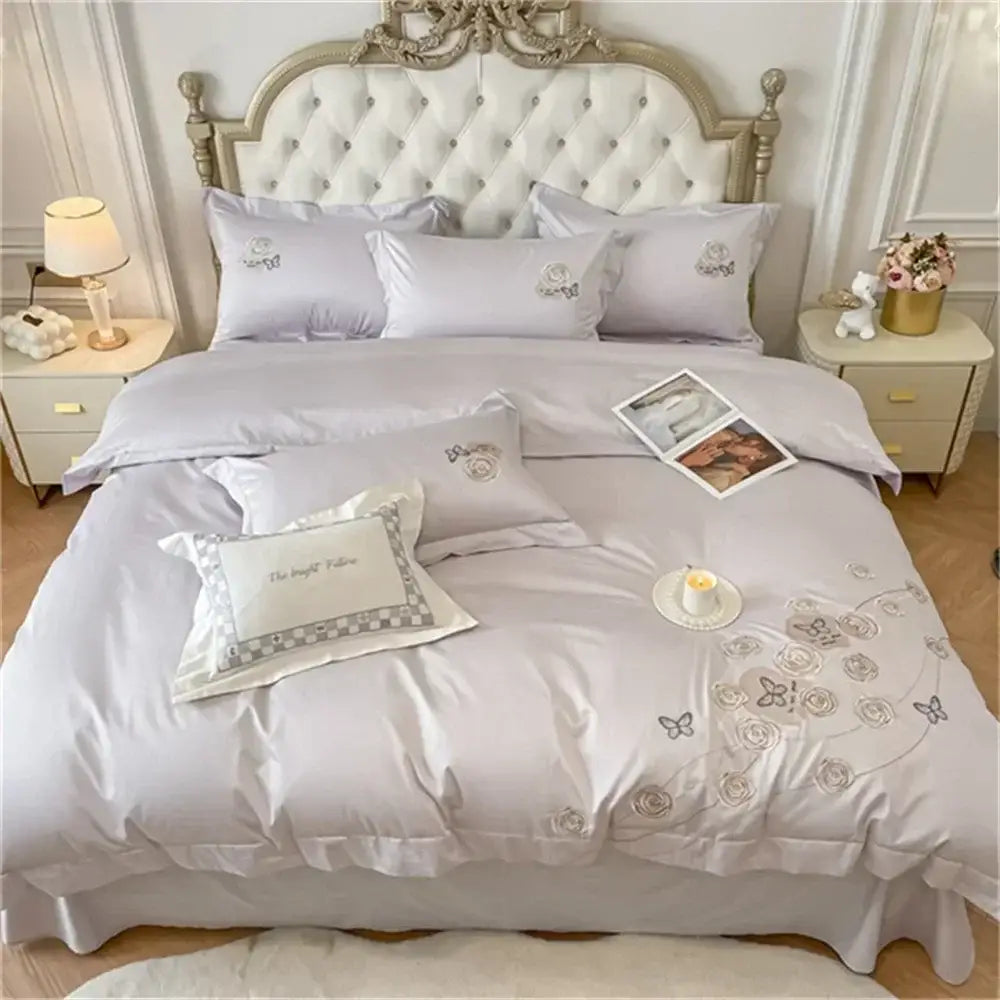 Elegant lavender satin duvet cover set with delicate butterfly and rose embroidery made of egyptian cotton