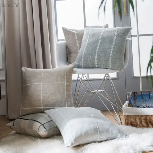 Beige and light gray linen throw pillows with subtle woven patterns featuring decorbites brown grey stripe embroidery for living room decor