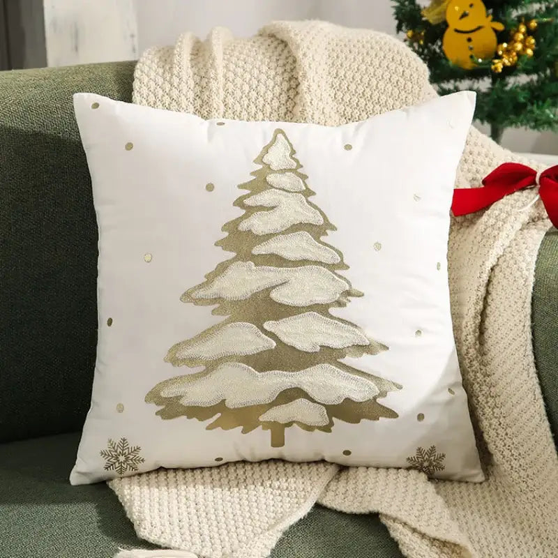 White throw pillow cover with gold embroidered snow-covered pine tree and metallic dots for decorbites embroidered christmas decor