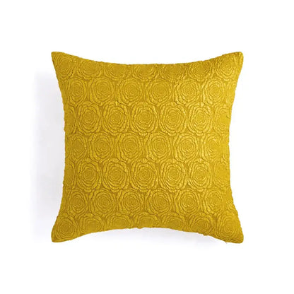 A square mustard-yellow pillow case with an embossed rose pattern featuring decorbites citron flowers plants decor