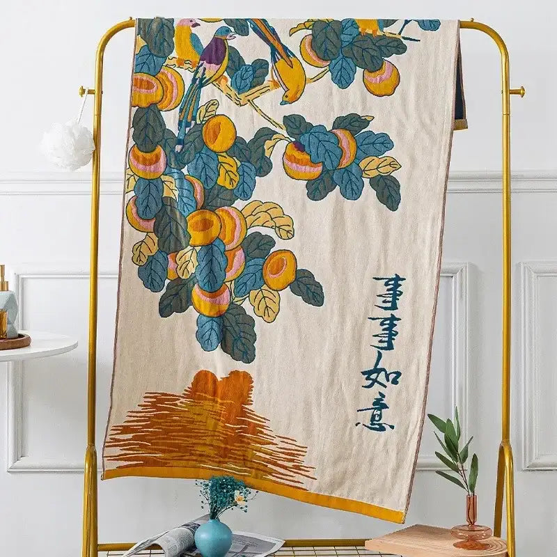 Beige decorbites cotton gauze bath towel with vibrant embroidered birds and fruit design for elegant bathroom decor