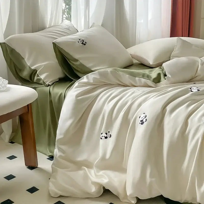 Cream satin ice silk bedding sets with subtle black panda embroidery for bedroom sleep by decorbites ice silk