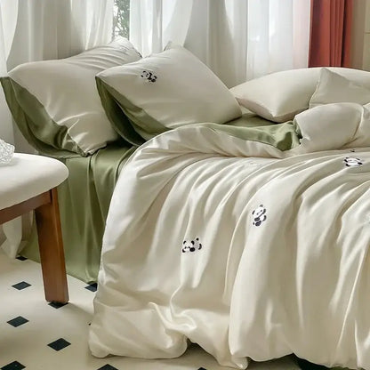 Cream satin ice silk bedding sets with subtle black panda embroidery for bedroom sleep by decorbites ice silk