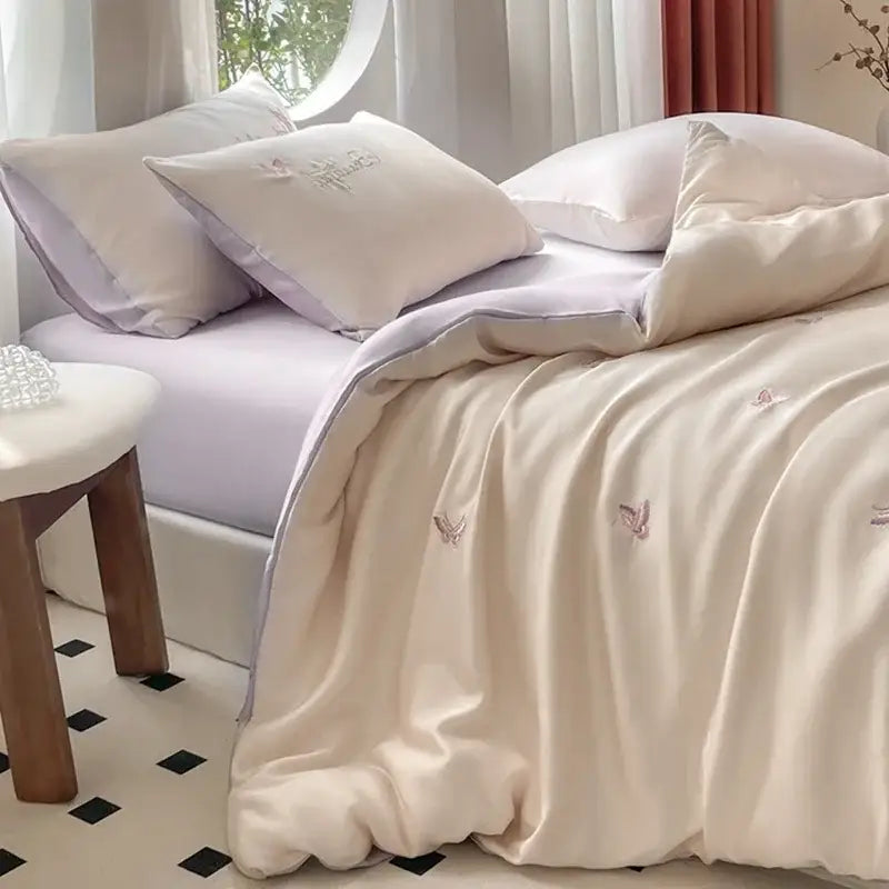 Cream satin ice silk bedding set with delicate pink butterfly embroidery for elegant bedroom decorbites ice silk