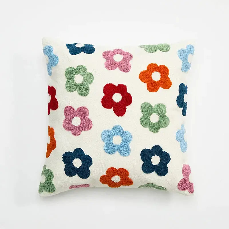 A cozy cream-colored cushion cover with embroidered daisy dandelion and colorful textured floral patterns for living room decor