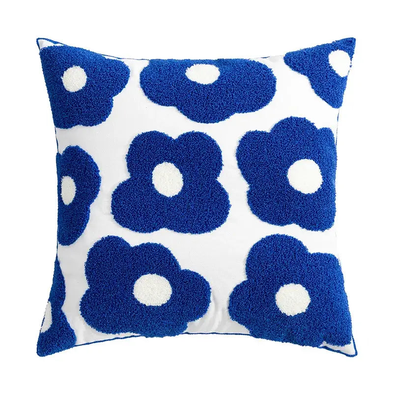 Blue and white cushion cover featuring an embroidered daisy dandelion design with plush textured fabric for living room decor