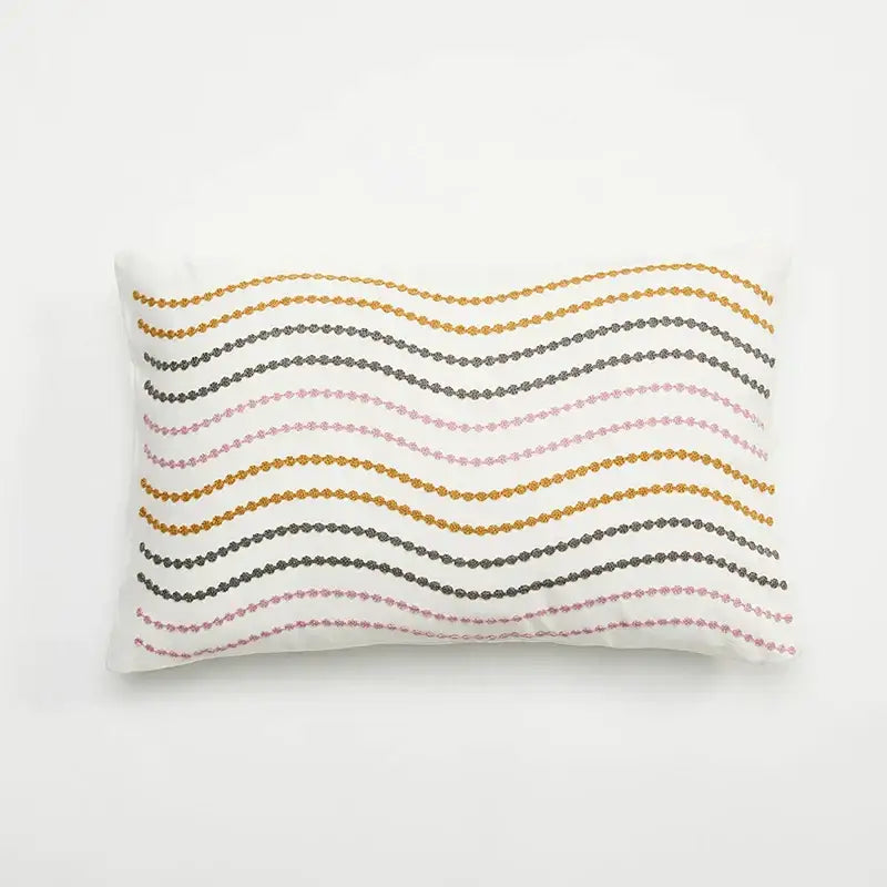 White cushion cover with embroidered daisy dandelion featuring gold gray and pink beaded embroidery for living room decor