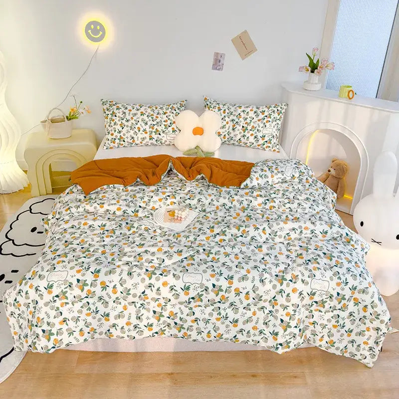 Embroidered double gauze rabbit print quilt bedroom comforter with white floral-patterned orange and green botanical prints