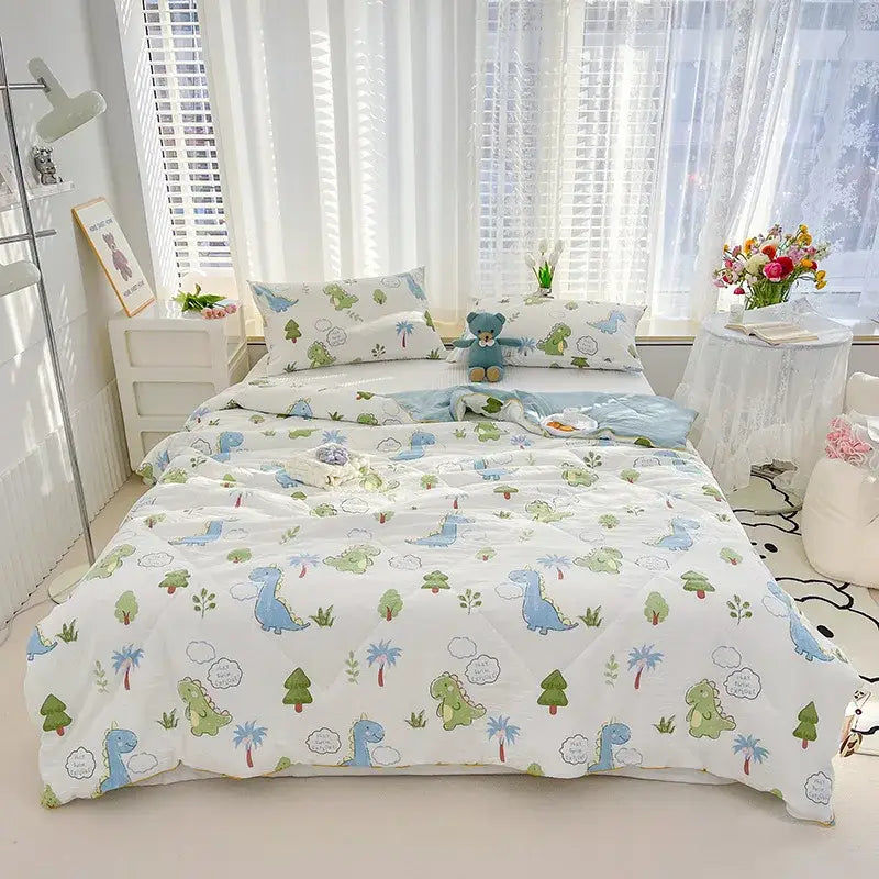 Embroidered double gauze rabbit print quilt comforter with white dinosaur-themed cotton fabric in blue and green designs
