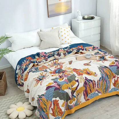 Vibrant floral-patterned duvet cover in cream navy blue and mustard yellow made from soft decorbites cotton gauze