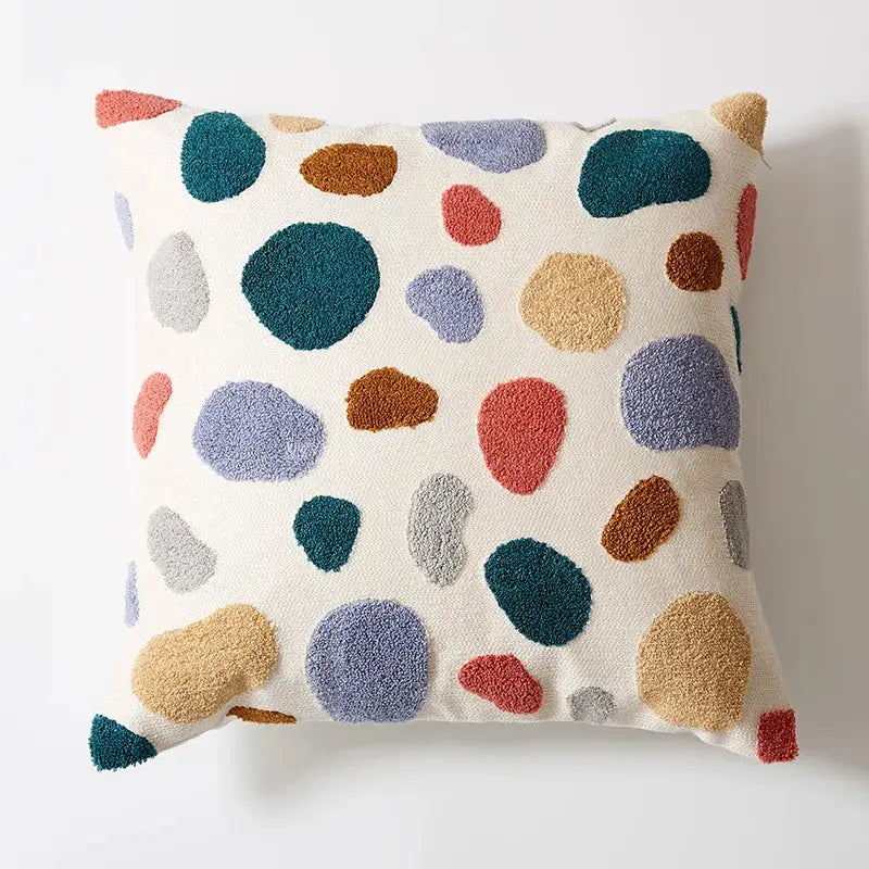 Cream-colored pillow cover with embroidered floral dot pattern of multicolored abstract circles for home decor
