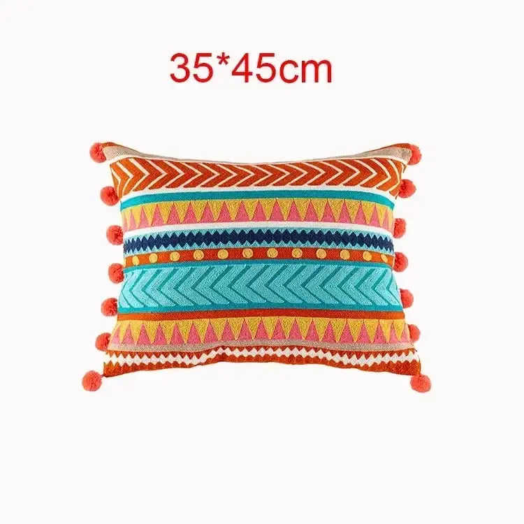 Embroidered flower boho flower boho long cushion covers with vibrant geometric patterns and red pom-pom trim