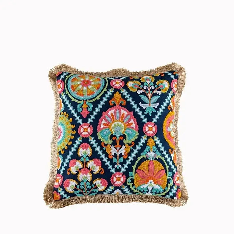 Vibrant embroidered flower boho long cushion cover with navy base floral and geometric patterns framed by natural fringe