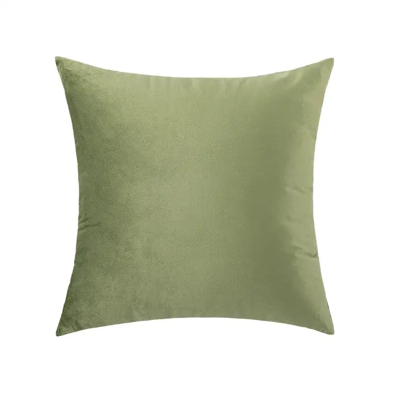 A soft sage green velvet throw pillow with plush texture ideal as an embroidered flower pillowcase cover