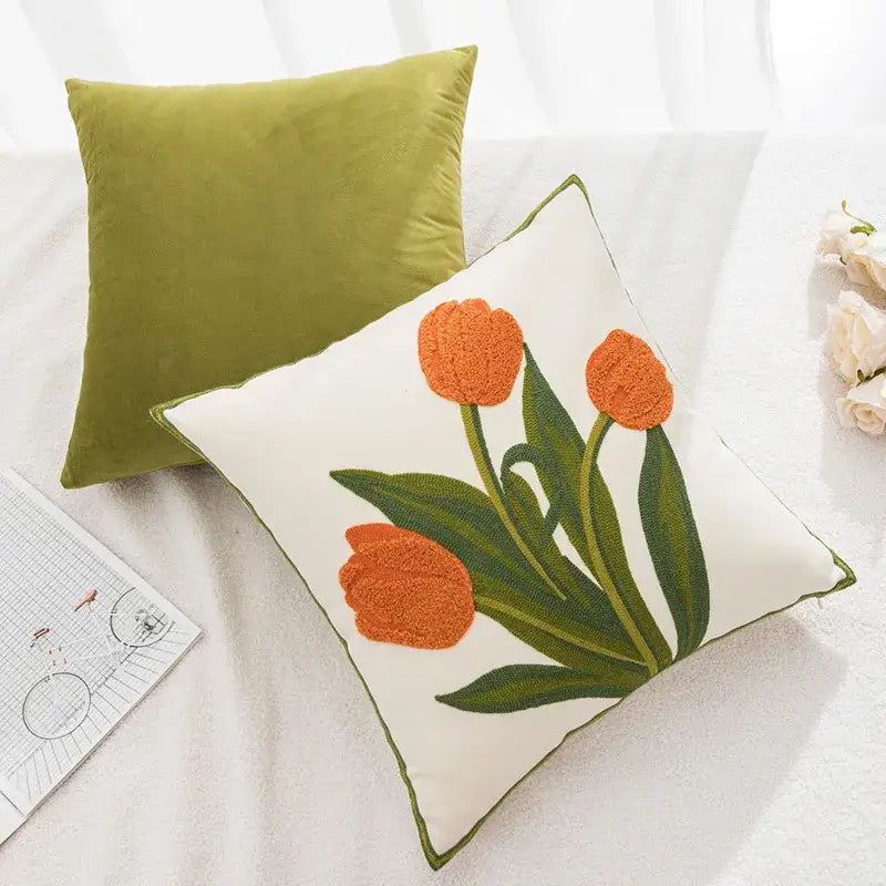 Cream-colored pillowcase cover with embroidered orange tulips and olive-green border for living room decor