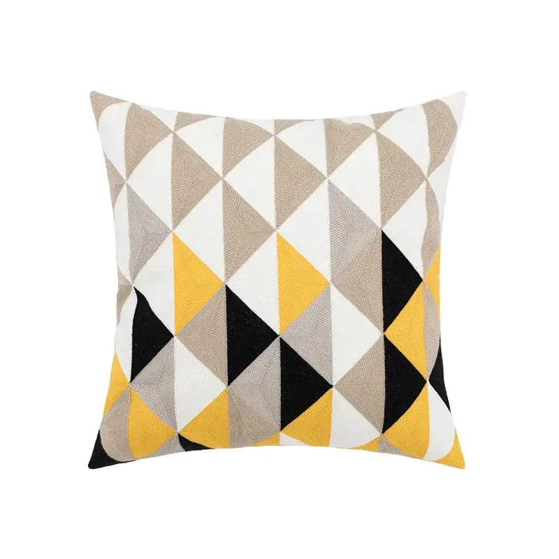 Embroidered green and gold fish pillow cover with beige white black and mustard yellow geometric pattern for living room