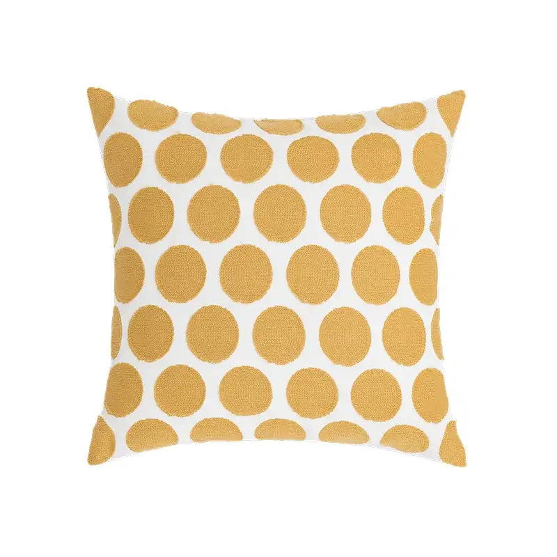 Embroidered green and gold fish pillow cover with daisy yellow floral geometric mustard-yellow patterns on white background