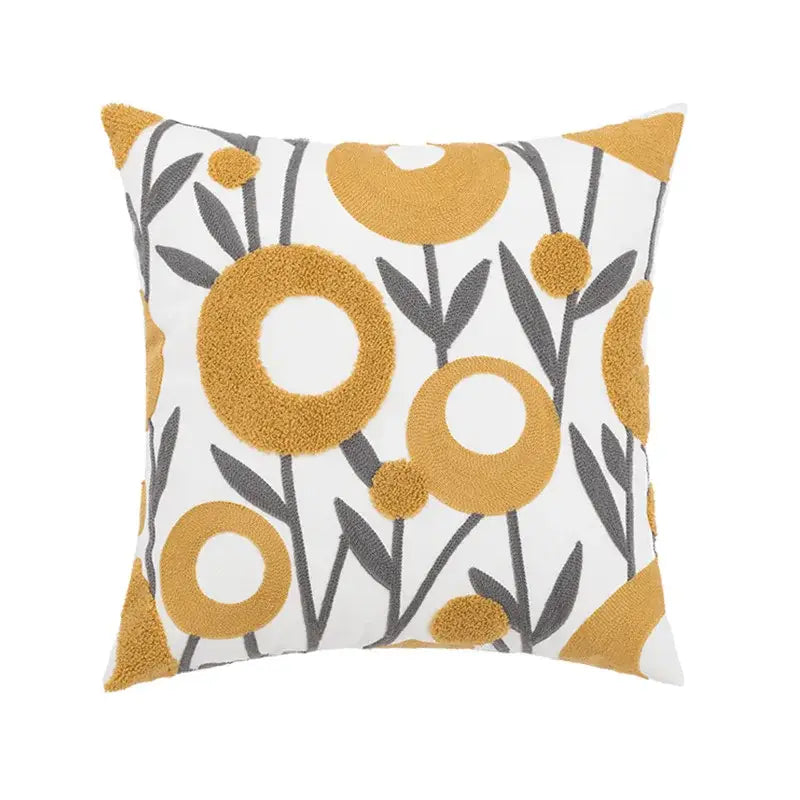 Embroidered pillow cover with daisy yellow floral circular patterns on white base for living room decor