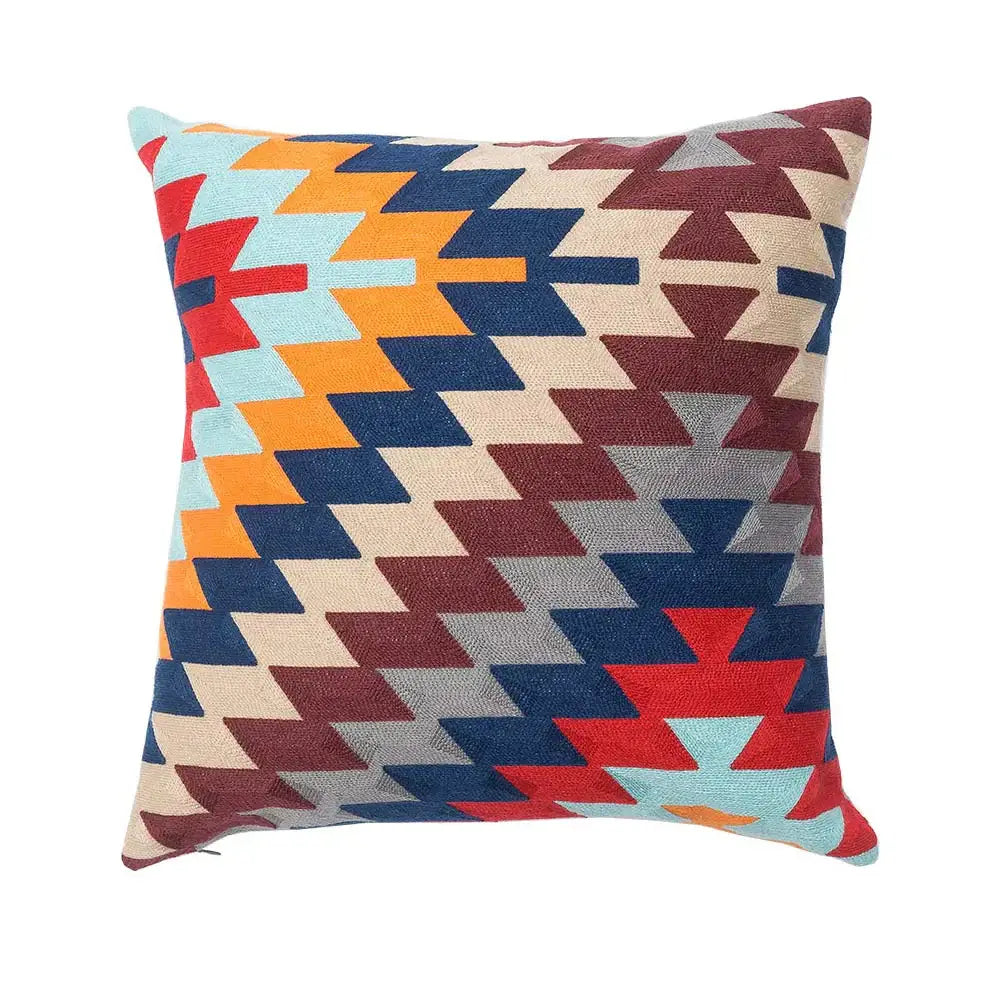 Vibrant embroidered kilim style cushion cover with geometric red, orange, navy blue, and beige woven textile design