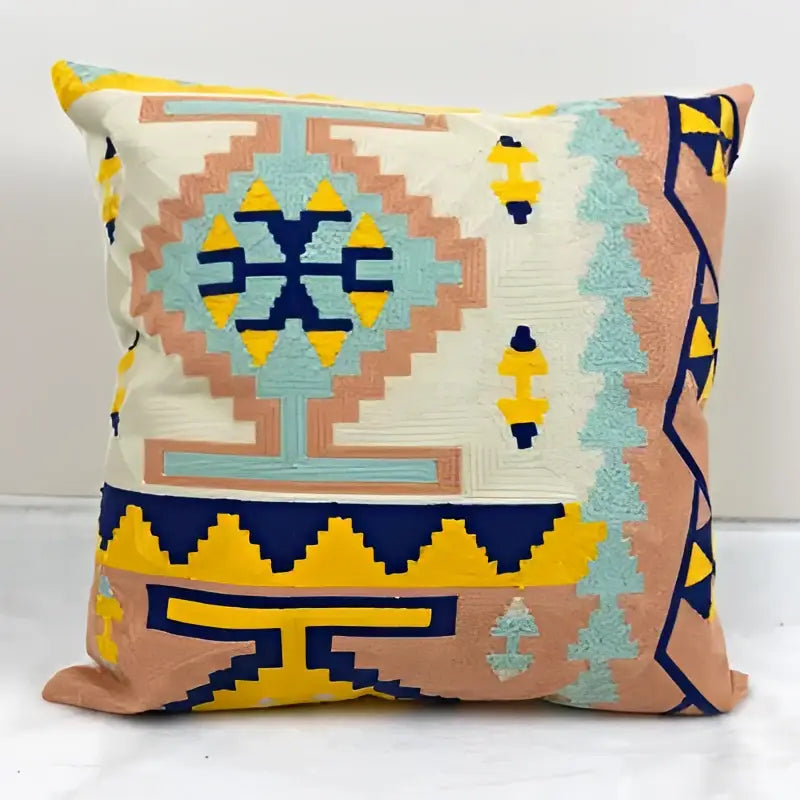 Beige peach and turquoise embroidered kilim style cushion cover with geometric patterns for living room decor