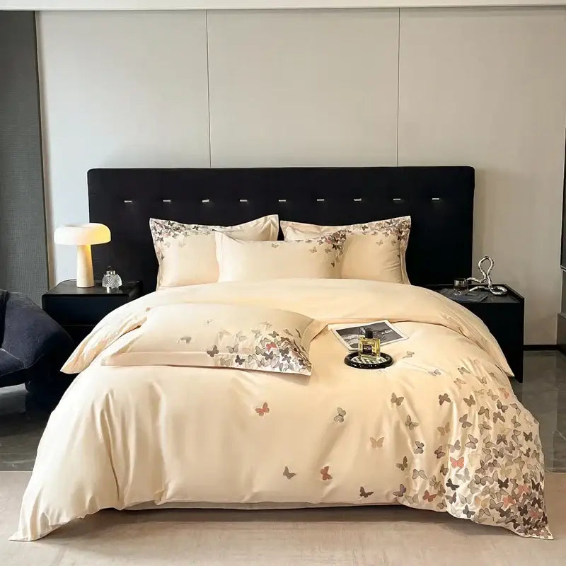 Cream-colored satin bedding set with elegant decorbites butterflies embroidery in soft earthy tones for bedroom use
