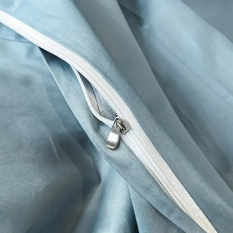 Light blue satin bedding set with white zipper and metallic pull tab featuring decorbites butterflies embroidery