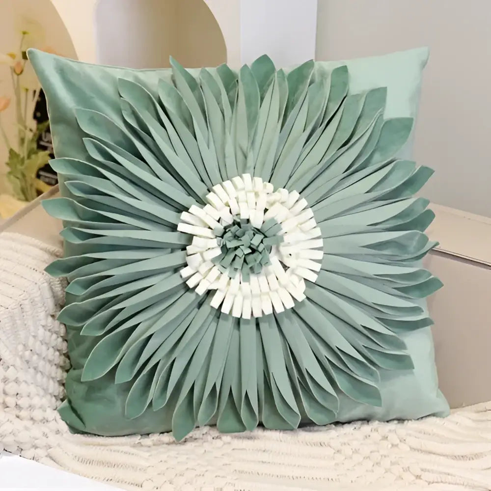 A mint green velvet square pillowcase with three-dimensional floral design and white center for decorbites blue hyacinth bedroom