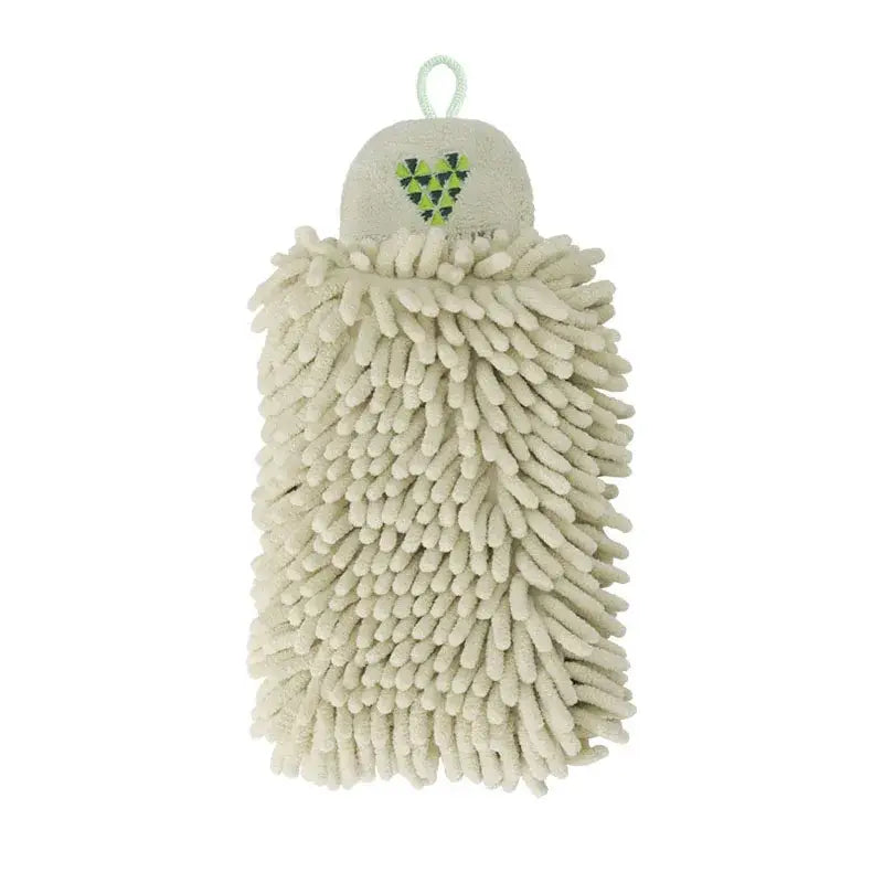 Beige microfiber hand towel with green and black triangular embroidery for kitchen decor in pale green and cream
