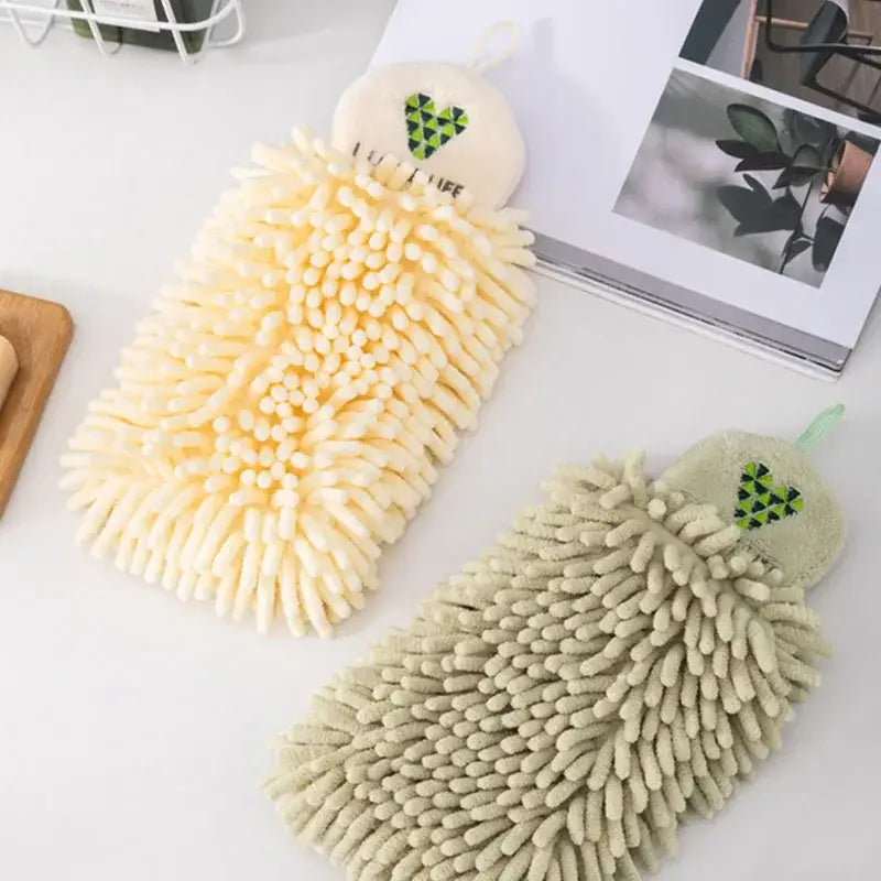 Cream-colored plush microfiber hand towel with green heart embroidery perfect for kitchen decor and cleaning tasks