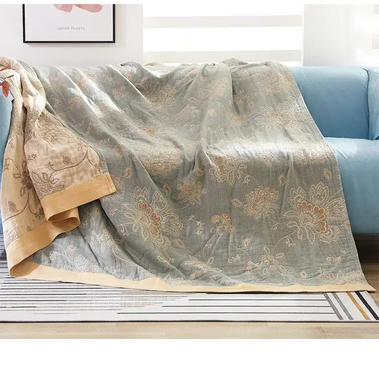 Embroidered sage green cotton gauze summer quilt with floral embroidery and tan border decorbites cotton gauze
