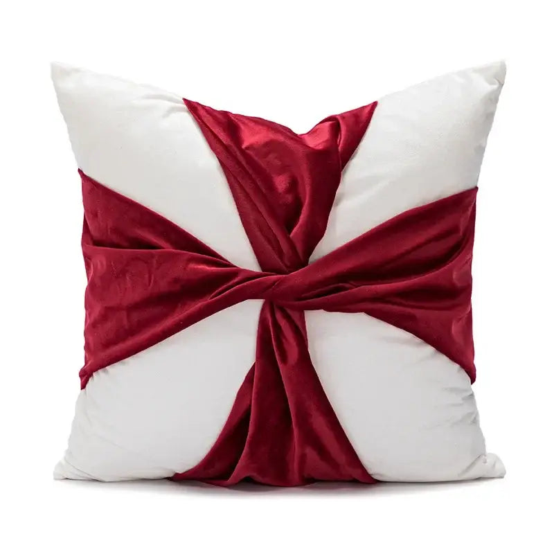 White cushion with burgundy velvet ribbon tied in cross knot for decorbites cartoon christmas pillow covers