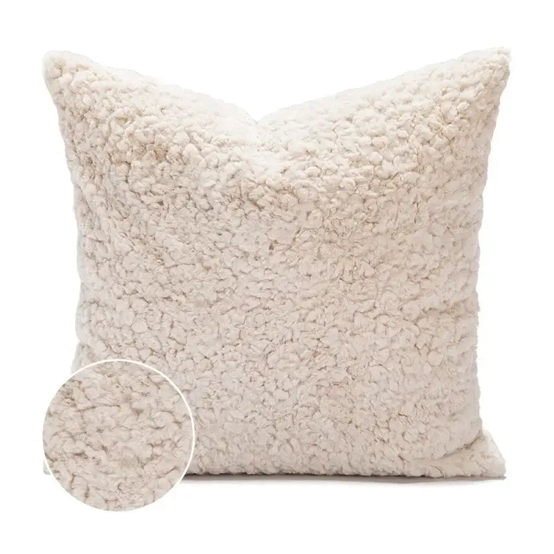 Cream-colored plush sheepskin pillow with soft texture featured in decorbites cartoon christmas pillow covers