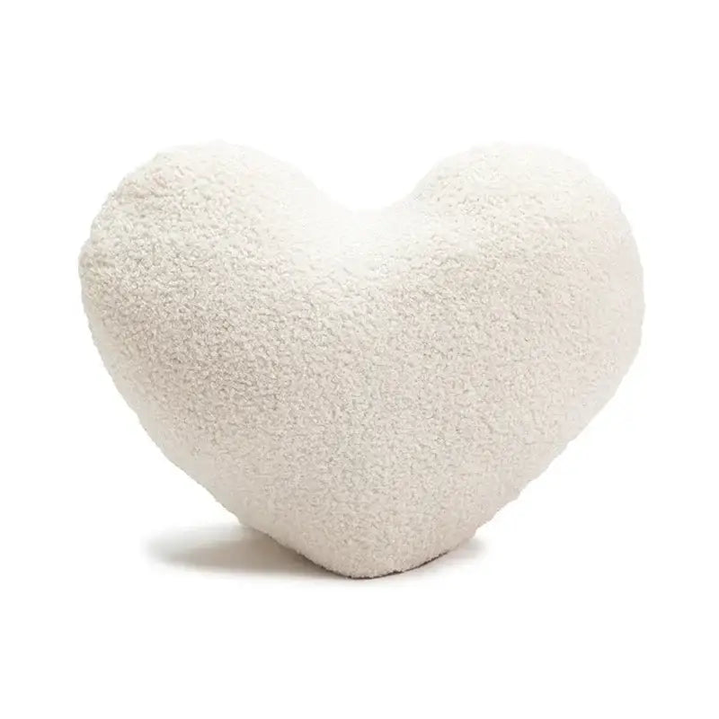 Cream-colored plush heart-shaped pillow with soft textured surface for decorbites cartoon christmas pillow covers