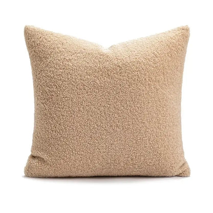 Beige faux shearling throw pillow with soft textured surface complementing decorbites cartoon christmas pillow covers