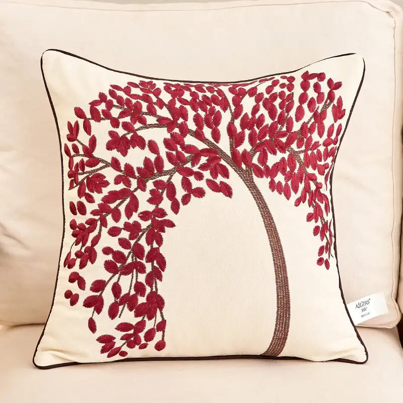 Cream-colored embroidered cushion cover featuring a tree with red leaves and brown trunk for living room sofa