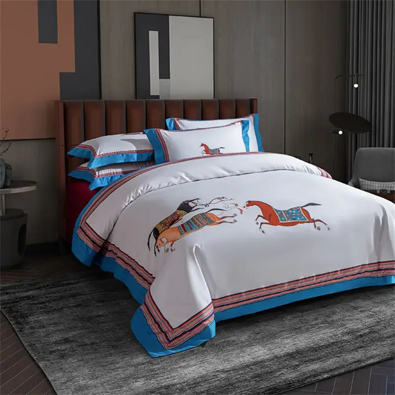 Embroidered white satin bedding set with vibrant blue and red striped trim and decorbites galloping horse design
